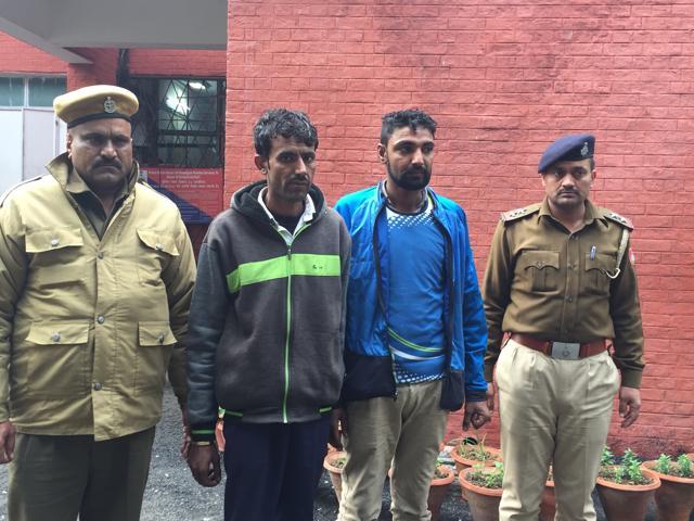 Bus driver Sonu (blue jacket ) and Rajkumar in police custody at Sector 36 police station in Chandigarh on Tuesday. (Nikhil Sharma/HT Photo) Bus driver Sonu (blue jacket ) and Rajkumar in police custody at Sector 36 police station in Chandigarh on Tuesday. (Nikhil Sharma/HT Photo)