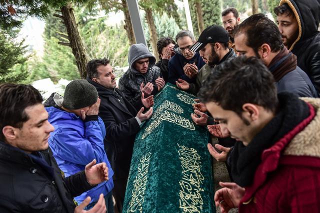 People pray next to the coffin of Mohamed Elhot, one of the victims of the Reina night club attack, during his funeral ceremony on January 3 in Istanbul. (AFP) People pray next to the coffin of Mohamed Elhot, one of the victims of the Reina night club attack, during his funeral ceremony on January 3 in Istanbul. (AFP)