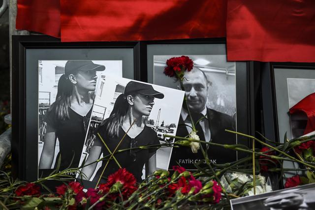 Pictures of victims of the New Year's Day attack on an Istanbul nightclub lie on Turkish national flags and flowers in front of the Reina nightclub on January 3. (AFP) Pictures of victims of the New Year's Day attack on an Istanbul nightclub lie on Turkish national flags and flowers in front of the Reina nightclub on January 3. (AFP)