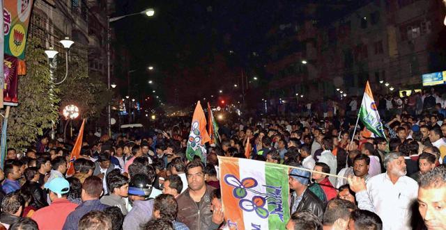 Trinamool Congress activists shout slogans in front of the BJP office in Kolkata. (PTI) Trinamool Congress activists shout slogans in front of the BJP office in Kolkata. (PTI)