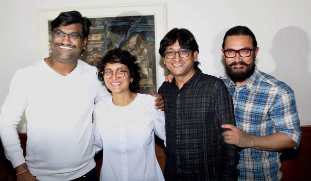 Aamir Khan along with his wife Kiran Rao and music composers Ajay Gogavale and Atul Gogavale during the launch of a music video shot by filmmaker Nagraj Manjule to announce the Satyamev Jayate Water Cup in Mumbai. (PTI) Aamir Khan along with his wife Kiran Rao and music composers Ajay Gogavale and Atul Gogavale during the launch of a music video shot by filmmaker Nagraj Manjule to announce the Satyamev Jayate Water Cup in Mumbai. (PTI)