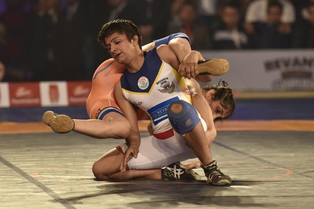 Ritu Phogat during a wrestling match at IGI Stadium in Delhi. (Ravi Choudhary/HT Photo) Ritu Phogat during a wrestling match at IGI Stadium in Delhi. (Ravi Choudhary/HT Photo)