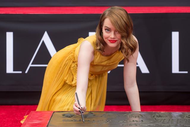 Emma Stone attends 'Ryan Gosling and Emma Stone hand and footprint ceremony' at TCL Chinese Theatre IMAX on December 7, 2016 in Hollywood, California. (AFP)