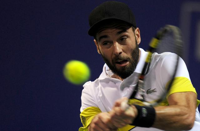Benoit Paire of France returns a shot to Yuki Bhambri of India during their second round men's singles match of the Chennai Open Tennis Championship. (AFP) Benoit Paire of France returns a shot to Yuki Bhambri of India during their second round men's singles match of the Chennai Open Tennis Championship. (AFP)