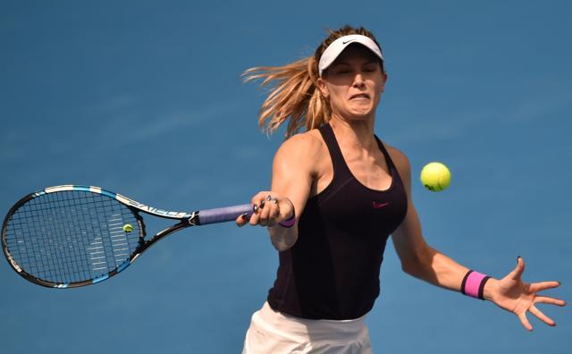Eugenie Bouchard of Canada hits a return to Shuai Zhang of China in their women's first round match at the Sydney Open tennis tournament. (AFP) Eugenie Bouchard of Canada hits a return to Shuai Zhang of China in their women's first round match at the Sydney Open tennis tournament. (AFP)