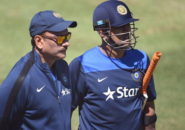Ravi Shastri with Mahendra Singh Dhoni at the MCG in Melbourne during the India cricket team’s tour of Australia in 2014. (AFP/Getty Images)
