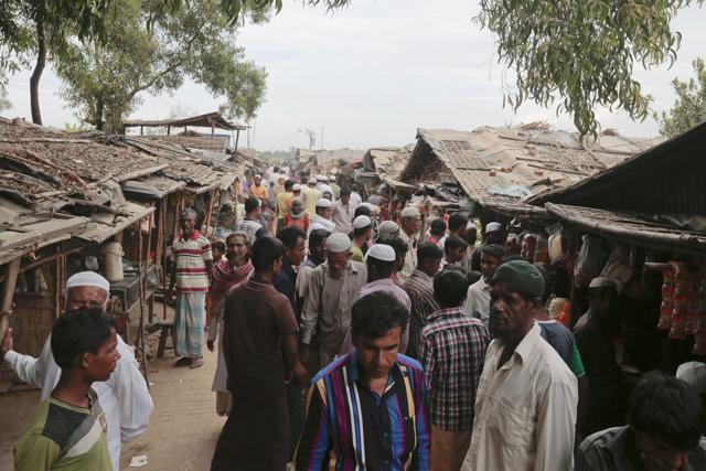 Rohingya from Myanmar make their way to an unregistered refugee camp in Teknaf, Bangladesh. (AP file photo) Rohingya from Myanmar make their way to an unregistered refugee camp in Teknaf, Bangladesh. (AP file photo)