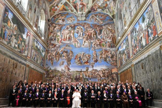 Members of the diplomatic corps accredited to the Holy See with Pope Francis (C) in the Sistine Chapel at the end of an audience for the traditional exchange of New Year greetings on Monday. (AFP photo) Members of the diplomatic corps accredited to the Holy See with Pope Francis (C) in the Sistine Chapel at the end of an audience for the traditional exchange of New Year greetings on Monday. (AFP photo)