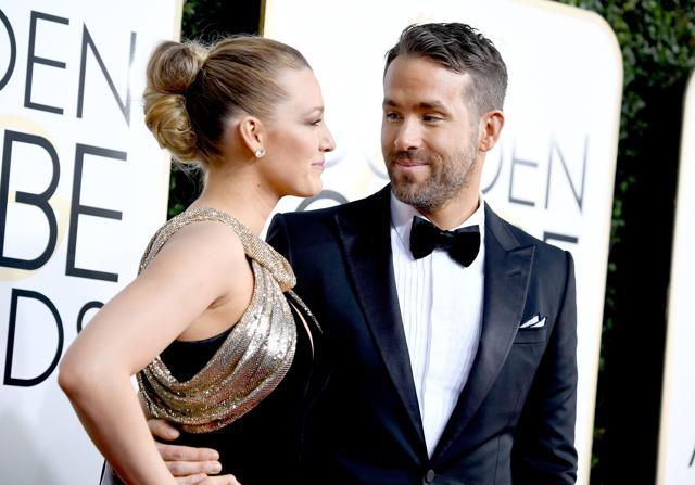 Actors Blake Lively and Ryan Reynolds attend the 74th Annual Golden Globe Awards. (AFP)