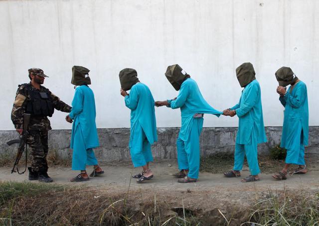 Taliban militants, who were arrested by Afghan security forces arrive during a presentation to the media in Jalalabad city, Afghanistan. (Reuters Photo) Taliban militants, who were arrested by Afghan security forces arrive during a presentation to the media in Jalalabad city, Afghanistan. (Reuters Photo)