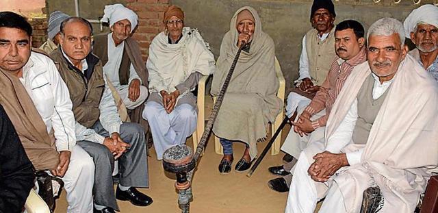 Members of Deshwal Khap in village Sahjoti. (HT Photo) Members of Deshwal Khap in village Sahjoti. (HT Photo)