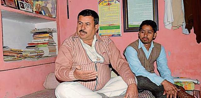 General secretary of Sarv Khap Subhash Baliyan with his son. (Chahatram/HT Photo) General secretary of Sarv Khap Subhash Baliyan with his son. (Chahatram/HT Photo)