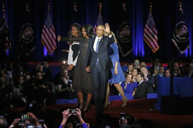 President Barack Obama waves as he is joined by First Lady Michelle Obama and his daughter Malia Obama. (AP Photo) President Barack Obama waves as he is joined by First Lady Michelle Obama and his daughter Malia Obama. (AP Photo)