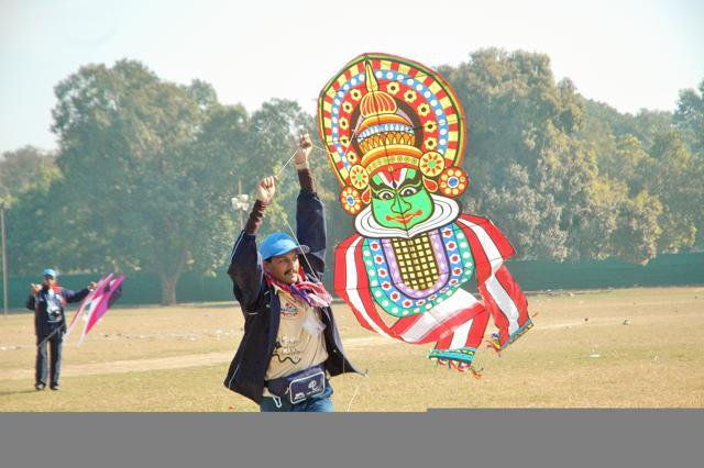 A kite-maker with one of his creations.