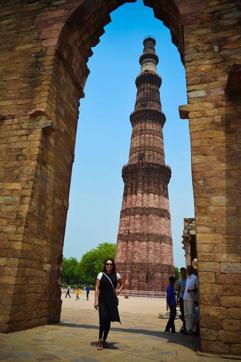 A foreigner on a photography tour of monuments in New Delhi, poses for a picture in front of Qutub Minar. (Facebook/ Delhi Photo Tours) A foreigner on a photography tour of monuments in New Delhi, poses for a picture in front of Qutub Minar. (Facebook/ Delhi Photo Tours)