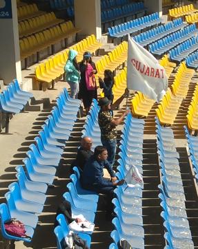 Gujarat fans cheer for their team during Day3 of the Ranji Trophy final against Mumbai at the Holkar Stadium in Indore. (HT Photo)