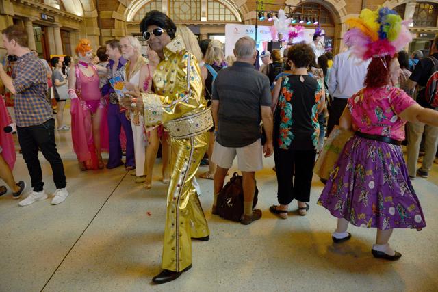 Elvis fans arrive at Central station to board a train to take them to The Parkes Elvis Festival. (AFP Photo) Elvis fans arrive at Central station to board a train to take them to The Parkes Elvis Festival. (AFP Photo)