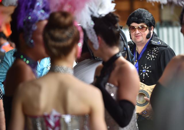 A fan strums Elvis melodies on his guitar as thousands throng the small rural town of Parkes to attend annual festival. (AFP Photo) A fan strums Elvis melodies on his guitar as thousands throng the small rural town of Parkes to attend annual festival. (AFP Photo)