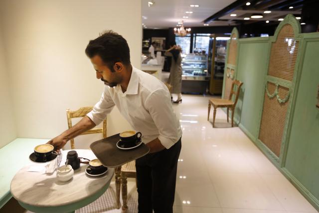 Shahriar Ahmed, a survivor of the July 1 attack at Holey Artisan Bakery, works at the reopened restaurant in Dhaka, Bangladesh, Thursday, January 12, 2017. (AP Photo) Shahriar Ahmed, a survivor of the July 1 attack at Holey Artisan Bakery, works at the reopened restaurant in Dhaka, Bangladesh, Thursday, January 12, 2017. (AP Photo)