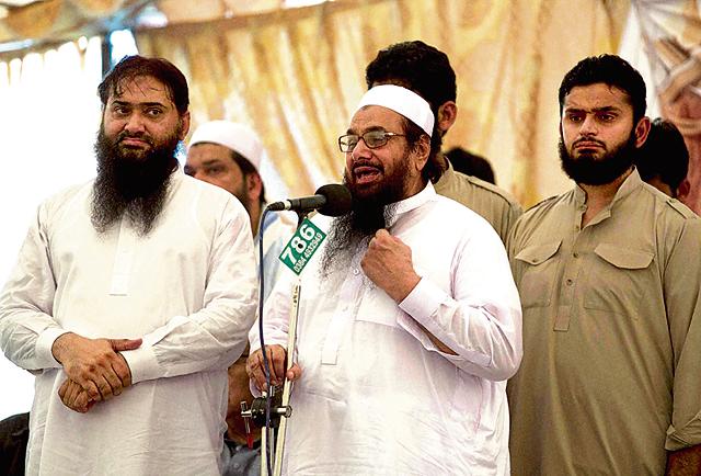 Hafiz Saeed, centre, chief of the Jamaat-ud-Dawa, addressing a gathering in Islamabad, Pakistan on June 10, 2016. (AP/PTI) Hafiz Saeed, centre, chief of the Jamaat-ud-Dawa, addressing a gathering in Islamabad, Pakistan on June 10, 2016. (AP/PTI)