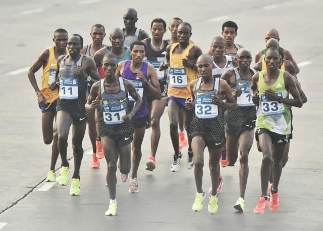 Elite athletes cross Haji Ali during the Mumbai Marathon. (Anshuman Poyrekar/HT Photo) Elite athletes cross Haji Ali during the Mumbai Marathon. (Anshuman Poyrekar/HT Photo)