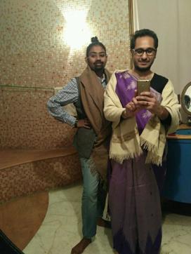 Two youngsters participate in the cross-dressing task. Two youngsters participate in the cross-dressing task.