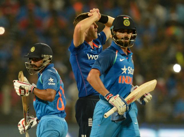Kedar Jadhav (left) and captain Virat Kohli run between the wickets during the first ODI between India vs England in Pune on Sunday. (AFP) Kedar Jadhav (left) and captain Virat Kohli run between the wickets during the first ODI between India vs England in Pune on Sunday. (AFP)