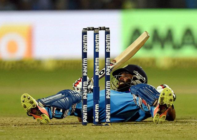 Kedar Jadhav falls during the first India-England ODI at MCA stadium in Pune on Sunday. (PTI) Kedar Jadhav falls during the first India-England ODI at MCA stadium in Pune on Sunday. (PTI)
