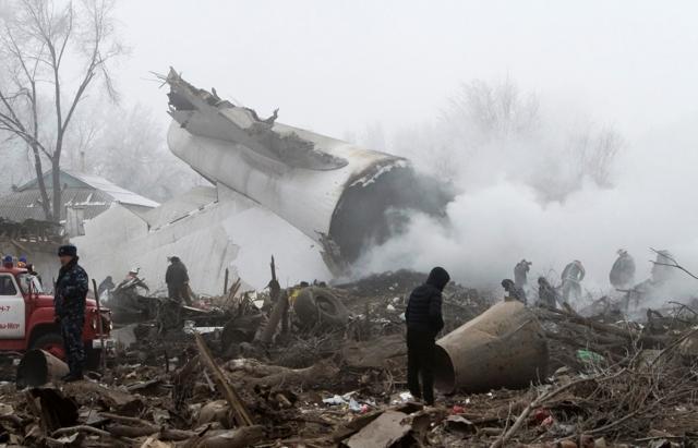 Rescue teams are seen at the crash site of a Turkish cargo jet near Kyrgyzstan's Manas airport outside Bishkek. (Reuters) Rescue teams are seen at the crash site of a Turkish cargo jet near Kyrgyzstan's Manas airport outside Bishkek. (Reuters)