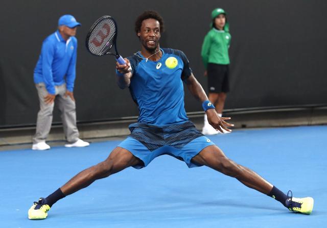 France's Gael Monfils plays a forehand return to Jiri Vesely of the Czech Republic during their first round match at the Australian Open tennis championships. (AP) France's Gael Monfils plays a forehand return to Jiri Vesely of the Czech Republic during their first round match at the Australian Open tennis championships. (AP)