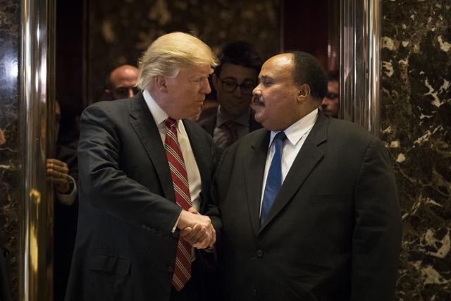 President-elect Donald Trump shakes hands with Martin Luther King III after their meeting at Trump Tower. (AFP Photo) President-elect Donald Trump shakes hands with Martin Luther King III after their meeting at Trump Tower. (AFP Photo)