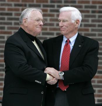 Neil Armstrong (left) is congratulated by fellow ex-astronaut Gene Cernan following the dedication ceremony of the Neil Armstrong Hall of Engineering at Purdue University in West Lafayette. (AP File Photo) Neil Armstrong (left) is congratulated by fellow ex-astronaut Gene Cernan following the dedication ceremony of the Neil Armstrong Hall of Engineering at Purdue University in West Lafayette. (AP File Photo)