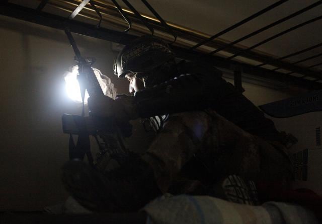 A member of Iraqi Counter-Terrorism Service (CTS) forces takes his position during a battle with Islamic State militants in Andalus neighborhood of Mosul, Iraq. (Reuters Photo) A member of Iraqi Counter-Terrorism Service (CTS) forces takes his position during a battle with Islamic State militants in Andalus neighborhood of Mosul, Iraq. (Reuters Photo)