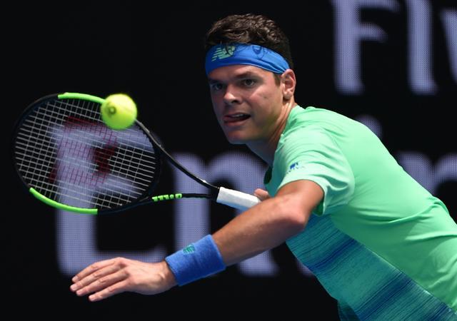 Milos Raonic of Canada hits a return against Dustin Brown of Germany during their men's singles match on day two of the Australian Open tennis tournament. (AFP) Milos Raonic of Canada hits a return against Dustin Brown of Germany during their men's singles match on day two of the Australian Open tennis tournament. (AFP)