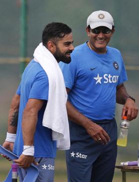 Indian team coach Anil Kumble, right, and captain Virat Kohli share a light moment during a training session (AP) Indian team coach Anil Kumble, right, and captain Virat Kohli share a light moment during a training session (AP)