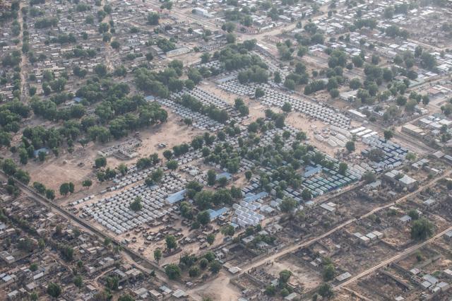 This file photo, taken on December 8, 2016, shows an aerial view of the Internally Displaced Persons Camp in Bama, northern Nigeria. The incident happened at about 9:00 am (0800 GMT) in Rann, in the far north of Borno state, the epicentre of the jihadists' insurgency, while food was being distributed to displaced people. (Stefan Heunis/AFP) This file photo, taken on December 8, 2016, shows an aerial view of the Internally Displaced Persons Camp in Bama, northern Nigeria. The incident happened at about 9:00 am (0800 GMT) in Rann, in the far north of Borno state, the epicentre of the jihadists' insurgency, while food was being distributed to displaced people. (Stefan Heunis/AFP)