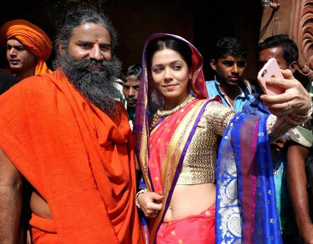 Baba Ramdev and TV Actress Himani Sahani click a selfie during the inauguration ceremony of upcoming Hindi television serial 'Vidrohi Sanyasi' based on the biography of Maharishi Swami Dayanand Saraswati, at N.D Studio in Mumbai on Friday. (PTI) Baba Ramdev and TV Actress Himani Sahani click a selfie during the inauguration ceremony of upcoming Hindi television serial 'Vidrohi Sanyasi' based on the biography of Maharishi Swami Dayanand Saraswati, at N.D Studio in Mumbai on Friday. (PTI)