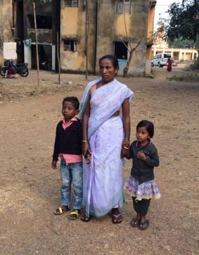Widow of slain SPO Mangal Hansda with kids Jagdish and Anjali at Mosabani (B Vijay Murty/HT Photo ) Widow of slain SPO Mangal Hansda with kids Jagdish and Anjali at Mosabani (B Vijay Murty/HT Photo )