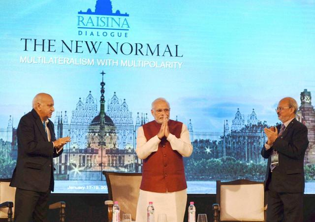 Prime Minister Narendra Modi with minister of state for external affairs MJ Akbar and ORF director Sunjoy Joshi at the Raisina Dialogue II in New Delhi on Tuesday. (PTI Photo) Prime Minister Narendra Modi with minister of state for external affairs MJ Akbar and ORF director Sunjoy Joshi at the Raisina Dialogue II in New Delhi on Tuesday. (PTI Photo)