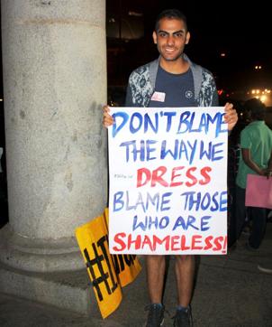 A protestor holds up a sign in Bengaluru (Photo courtesy: Night in my Shining Armour)