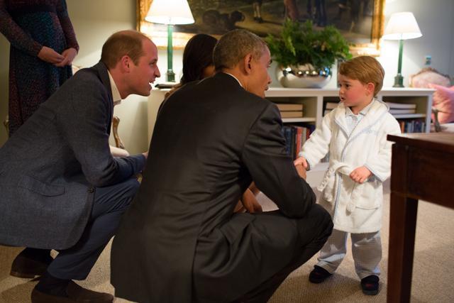 In this handout photo released by Kensington Palace, Britain's Prince George meets with US President Barack Obama at Kensington Palace, London. (AP File Photo)