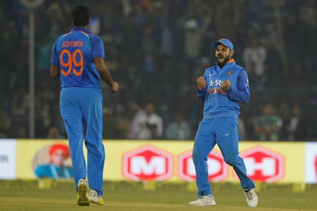 Virat Kohli celebrates with Ravichandran Ashwin as India took the vital wicket of Joe Root for 54. (BCCI)