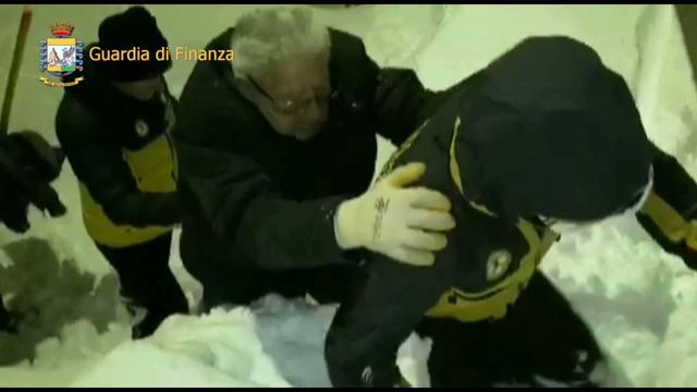 A man, centre, is helped during a rescue operation in the avalanche area following the avalanche in Farindola. Rescue workers were met with an eerie silence Thursday when they reached a four-star spa hotel in a mountainous earthquake region of central Italy where authorities said at least 30 people were missing, including at least two children. (AP) A man, centre, is helped during a rescue operation in the avalanche area following the avalanche in Farindola. Rescue workers were met with an eerie silence Thursday when they reached a four-star spa hotel in a mountainous earthquake region of central Italy where authorities said at least 30 people were missing, including at least two children. (AP)