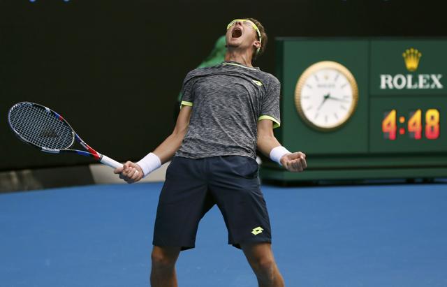 Denis Istomin celebrates after upsetting Serbia's Novak Djokovic on Thursday. (REUTERS) Denis Istomin celebrates after upsetting Serbia's Novak Djokovic on Thursday. (REUTERS)