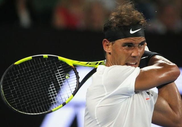 Rafael Nadal hits a shot during his Men's singles second round match against Cyprus' Marcos Baghdatis at the Australian Open. (REUTERS) Rafael Nadal hits a shot during his Men's singles second round match against Cyprus' Marcos Baghdatis at the Australian Open. (REUTERS)