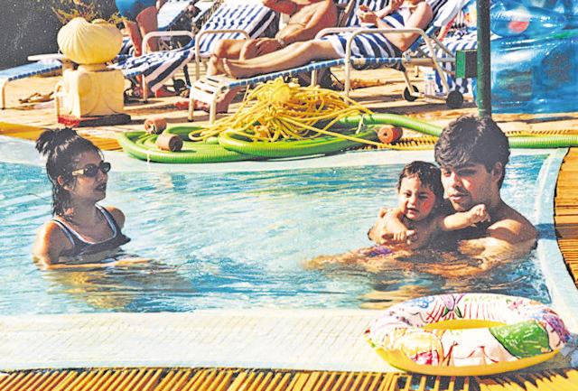 Johar with Shah Rukh Khan’s wife Gauri Khan and their son Aryan during the making of Kuch Kuch Hota Hai. (Penguin) Johar with Shah Rukh Khan’s wife Gauri Khan and their son Aryan during the making of Kuch Kuch Hota Hai. (Penguin)