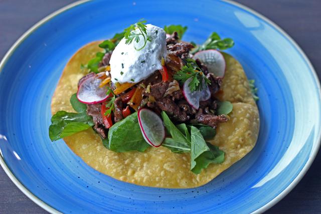The meat in the beef tostada was chewy, served on a tortilla that seemed to have been deep fried a while ago, which didn’t make it very exciting. (Satyabrata Tripathy/ HT Photo)