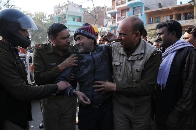 Noida, India - Jan. 19, 2017: A fire broke out in a garment manufacturing company at Sector 4, in Noida, India, on Thursday, January 19, 2017. Employees trapped in the building were rescued by locals and fire fighters. (Photo by Burhaan Kinu/ Hindustan Times) (Burhaan Kinu/HT PHOTO) Noida, India - Jan. 19, 2017: A fire broke out in a garment manufacturing company at Sector 4, in Noida, India, on Thursday, January 19, 2017. Employees trapped in the building were rescued by locals and fire fighters. (Photo by Burhaan Kinu/ Hindustan Times) (Burhaan Kinu/HT PHOTO)