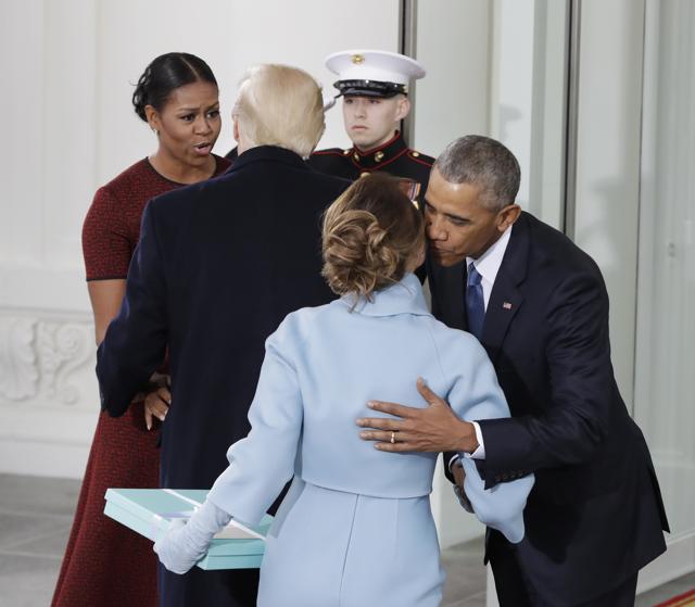 President Barack Obama greets Melania Trump as first lady Michelle Obama greets President-elect Donald Trump. (AP) President Barack Obama greets Melania Trump as first lady Michelle Obama greets President-elect Donald Trump. (AP)