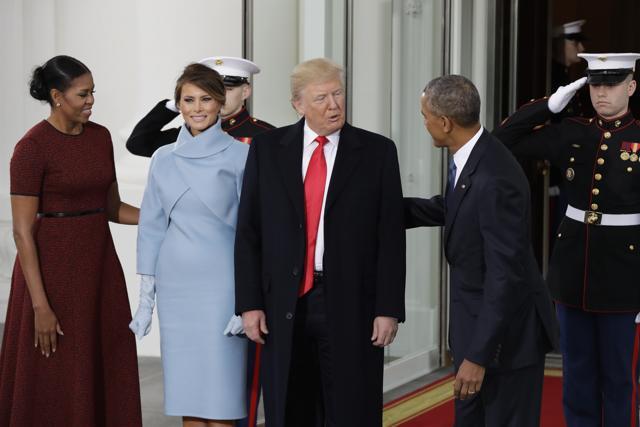 As the Obamas warmly greeted the Trumps, the outgoing President asked his successor, “How are you, How was Church,” referring to the church service that the Trumps attended earlier in the morning before arriving at the White House. (AP) As the Obamas warmly greeted the Trumps, the outgoing President asked his successor, “How are you, How was Church,” referring to the church service that the Trumps attended earlier in the morning before arriving at the White House. (AP)